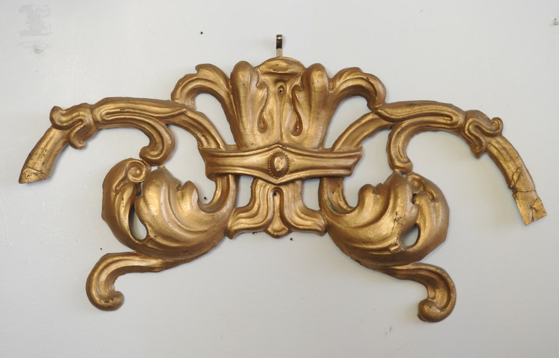 Vintage French / Italian Gilt Metal Wall Ornament: Repousse gilt metal wall ornament with baroque foliate scrolls. Appears to have been cut down from a larger piece. Approx. 21"W x 11" H.