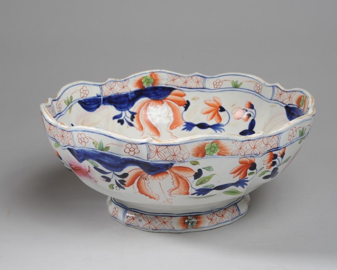 Antique English Imari Ironstone Bowl: 19th C. center bowl with barbed edge, shaped sides, decorated in Japanese Imari style but English. Impressed mark to underside: "Ironstone China". Wear to gilt rim, minor wear to enamels. Approx. 10 3
