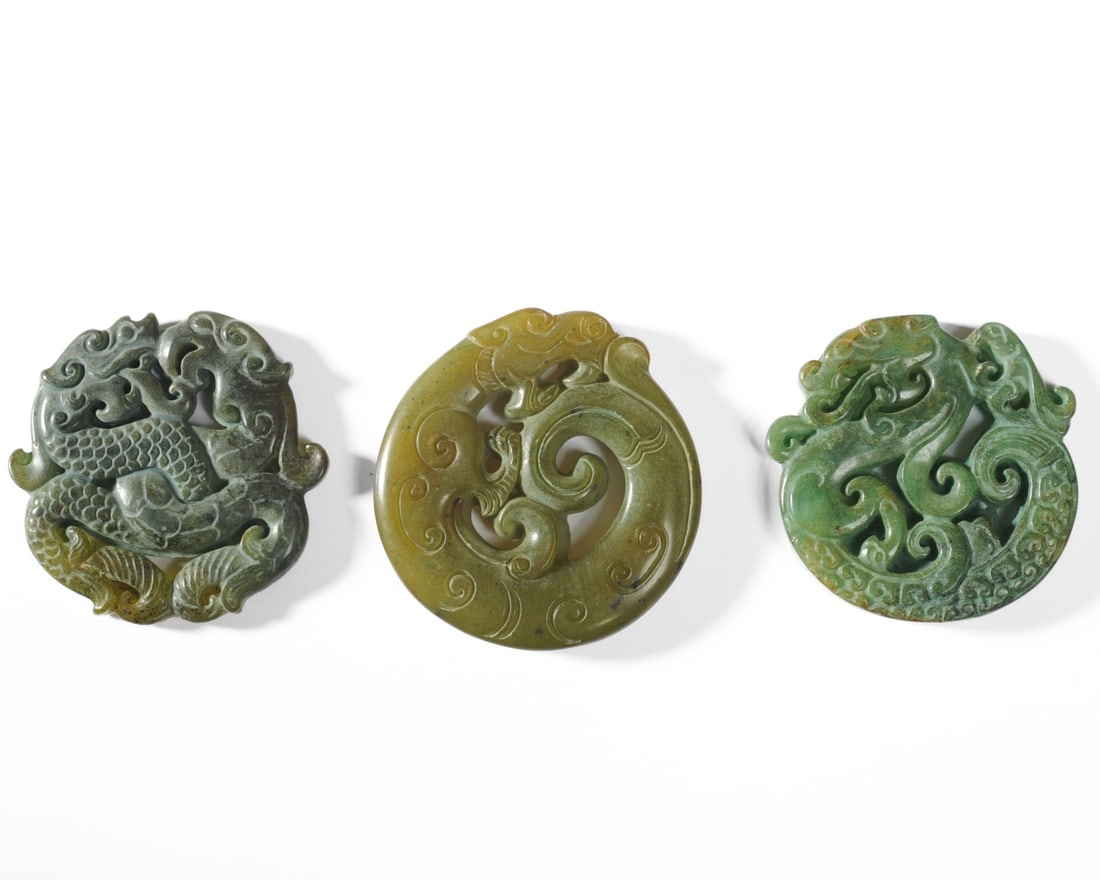 Three Chinese Carved Hardstone Dragon Pendants (1 of 5)