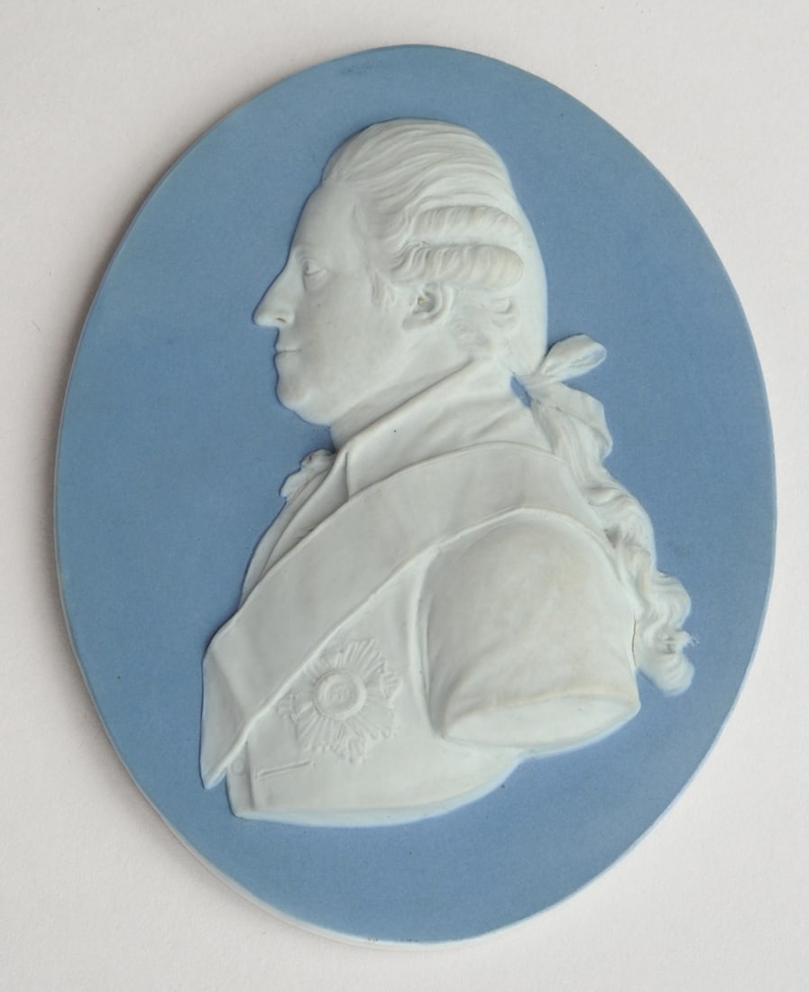 Wedgwood Blue Jasper Portrait Plaque: Wedgewood blue jasper portrait plaque, paper labels to verso, no visible chips, cracks or repairs. Approx. 4 1/4" x 3 1/4". Seamless shipping is available through LiveAuctioneers at checkout, but you