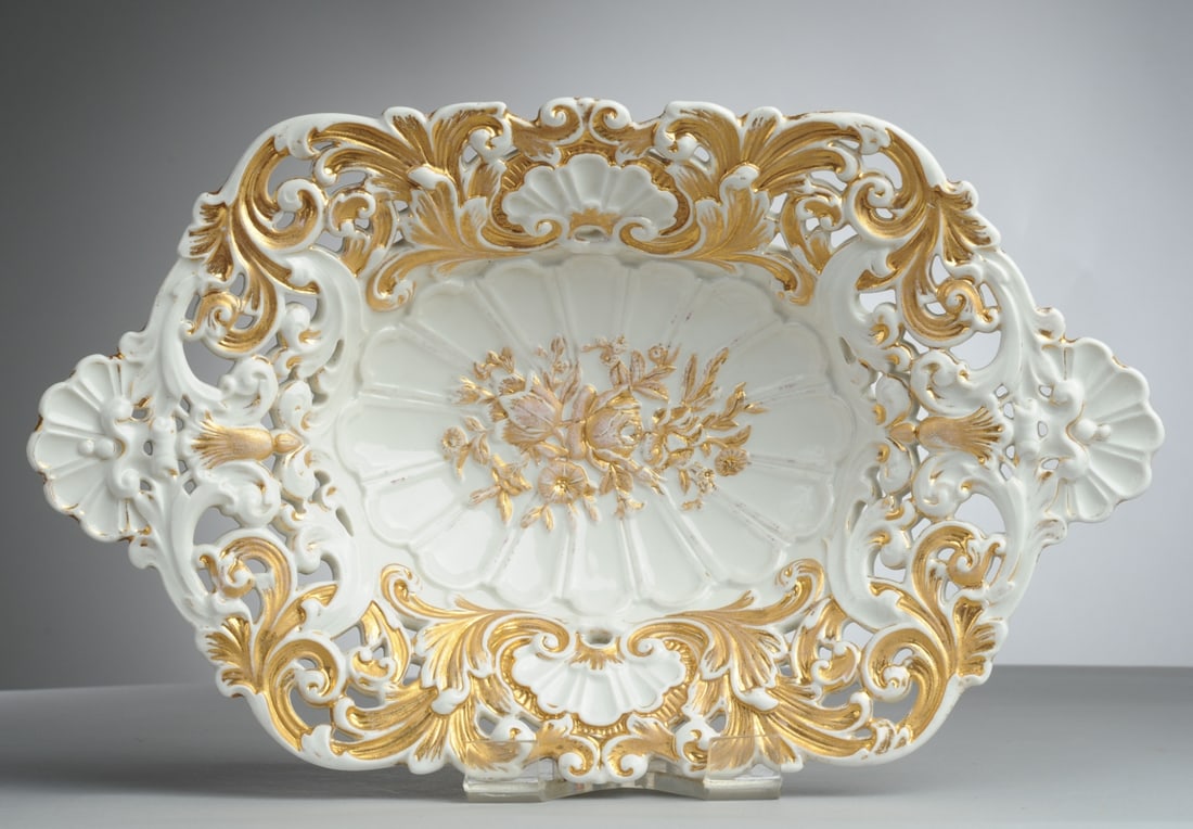 Antique Meissen Reticulated Centerpiece Bowl: Late 19th / early 20th century Meissen rococo bowl, crossed swords to underside, some losses to gilt, no visible chip, cracks or repairs. Approx. 14 1/4" x 8 3/4" x 2 3/4". Seamless shipping is availa