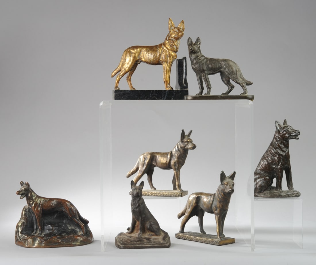 Cast Iron German Shepherd Bookends, Doorstops +: Lot of vintage cast iron, bronze, copper clad, etc. bookends, doorstops, and other figures of German Shepherd dogs. No makers marks found, though most have old felt table protector pads covering bases