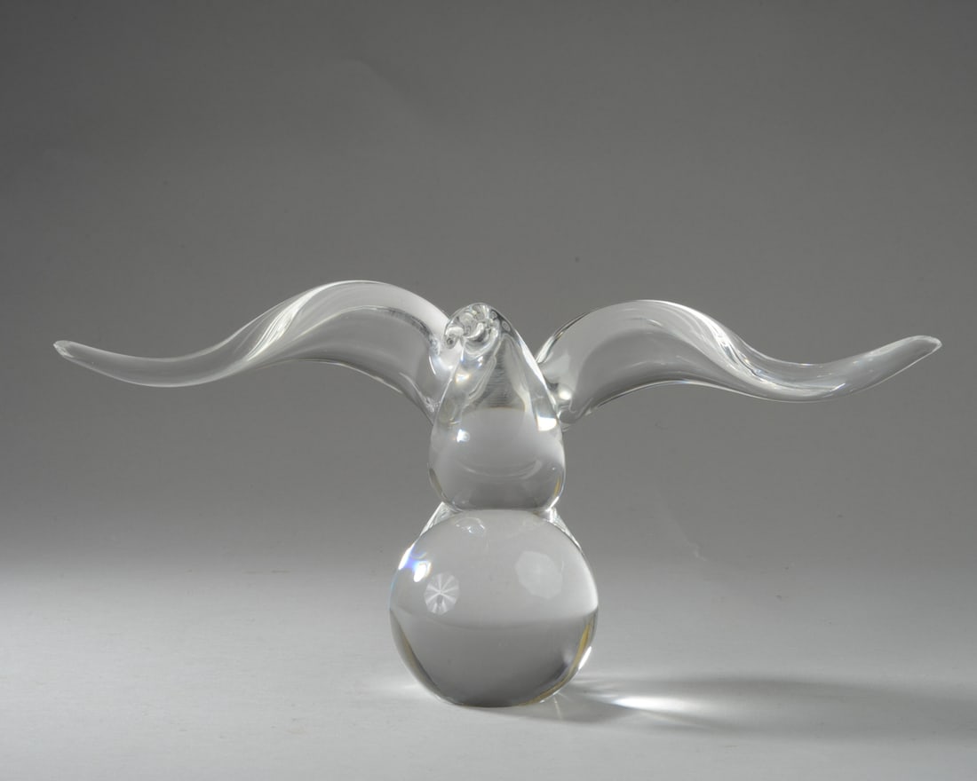 Steuben Glass Seagull: Crystal seagull in flight. Signed to base. Excellent condition. In original Steuben box. Approx 12 3/4" x 6 1/4" x 4". Box approx. 10" x 10" x 7 1/2". Seamless shipping is available through LiveAuctio