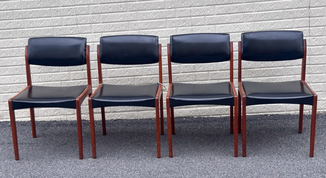 Four Bramin Danish Modern Chairs: With vinyl upholstery, marked to underside two show minor damage / in as-found condition. H: approx. 30 1/2". W: approx. 18 3/4". D: approx. 17 1/2". Seamless shipping is available through LiveAuction