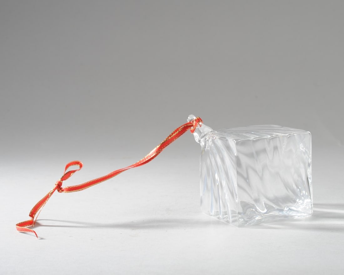 Art Glass Christmas Tree Ornament: Handsome square blown glass ornament with sweeping. free form ridges. No signature or mark found. Approx. 2 1/4" square plus the 3/4" glass loop in one corner. Seamless shipping is available through L