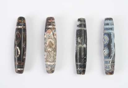 Four Antique Dzi Beads