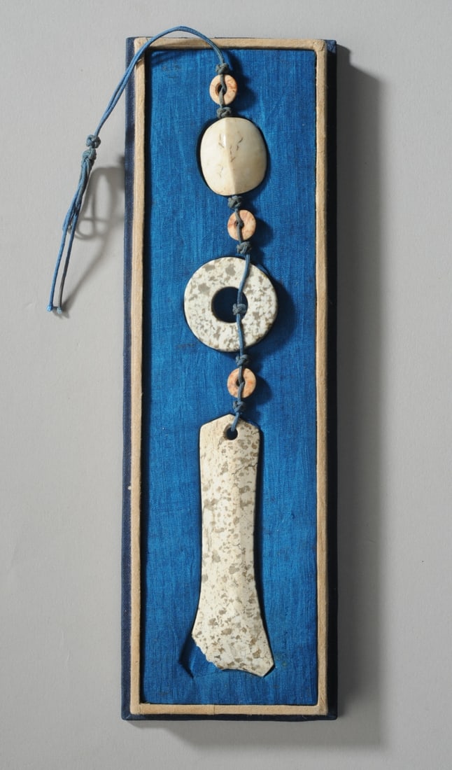 6 Pc. Han Dynasty Chicken Bone Jade Ornament: Official's ornament of three larger jade pieces strung together alternating with small jade discs, the topmost larger bead representing a turtle and finely shaped like a turtle shell. All in chicken b