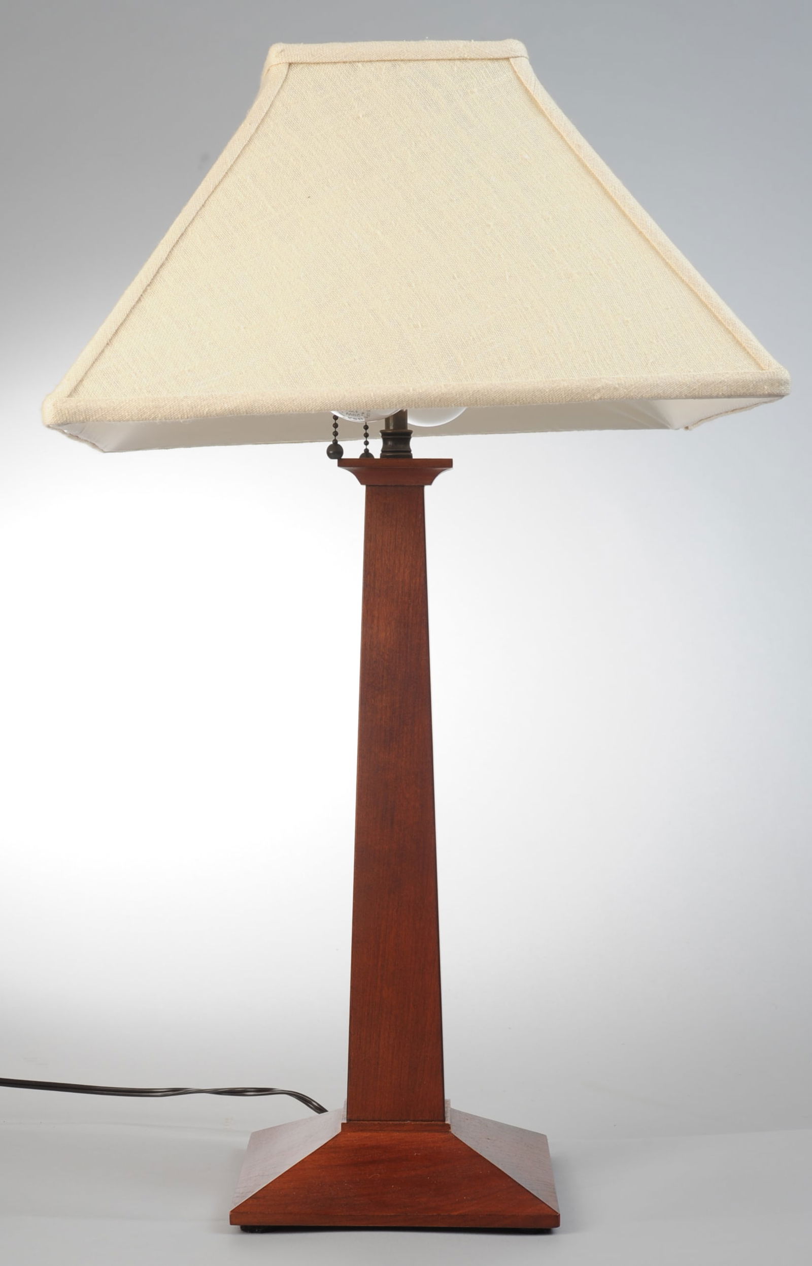 Stickley Table Lamp: Marked to underside, early 21st century, with shade, tested / working. H: approx. 25 1/4", shade: approx. 14 3/4" x 14 3/4" x 8 3/8". Seamless shipping is available through LiveAuctioneers at checkout