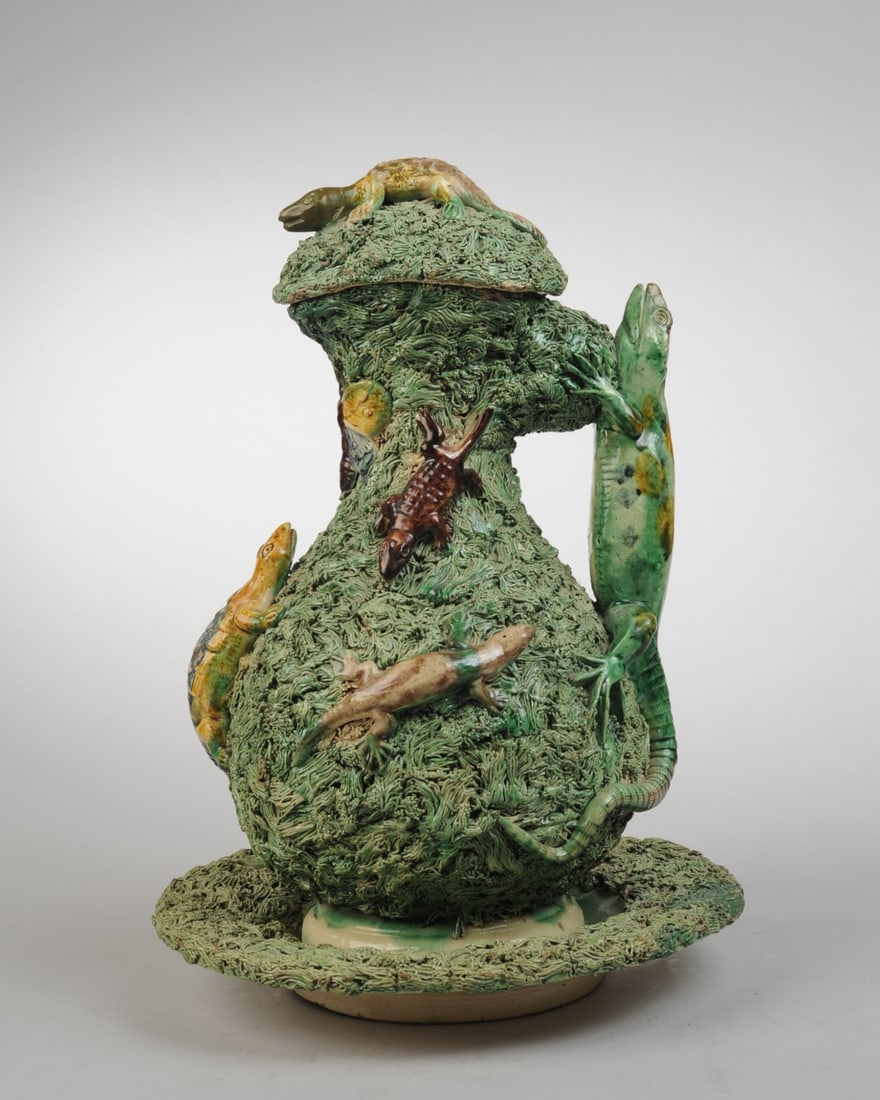 19th C. Mafra Portuguese Palissy Ware Ewer: With lid, underplate, and ewer covered with green moss, and with lizard handle and applied lizards and moth. Impressed crowned Mafra mark to base. Old repairs including repair to head of lizard on lid