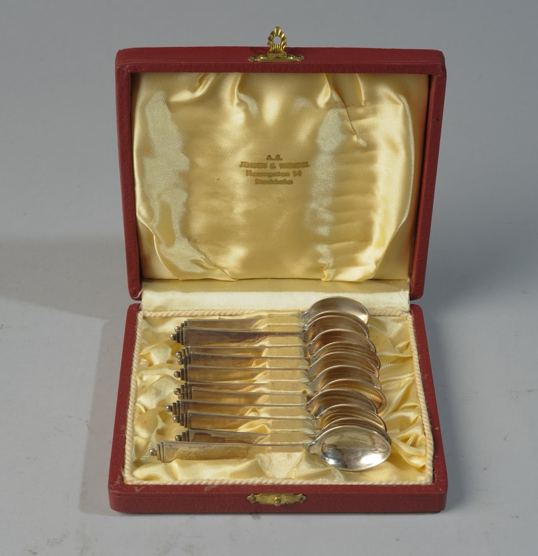 Twelve Georg Jensen Demitasse Spoons: Eleven are approx. 3 3/4" long, one is approx. 4 1/8" long, in box marked for Jensen & Wendel. Total weight: approx. 4.43 ozt. Box: approx. 5 5/8" x 5 1/8" x 1 1/8". Our primary recommendation is to a