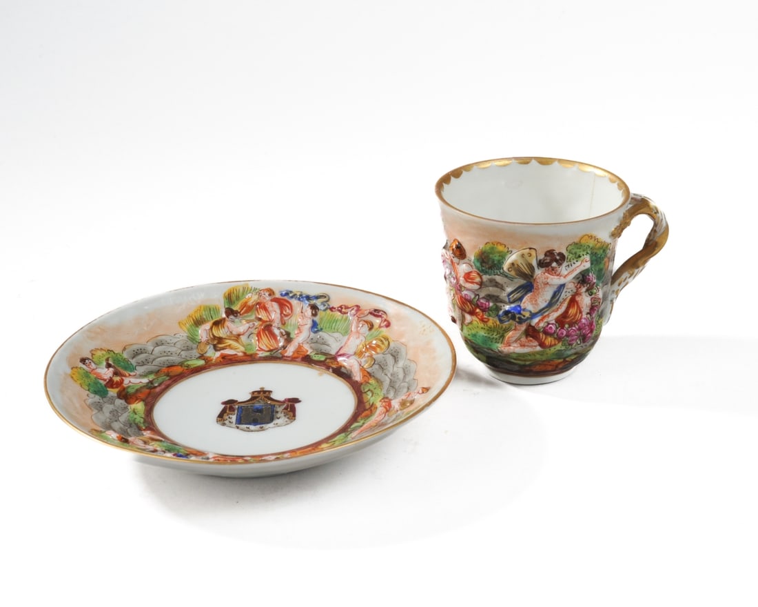 Royal Naples (Capodimonte) Armorial Cup & Saucer: C. 1771-1806 bespoke porcelain cup and saucer by Real Fabbrica Ferdinandea, Naples, likely made for a noble family of L'Aquila (Abruzzo) with ties to the Bourbon court at Naples, or a civic commission