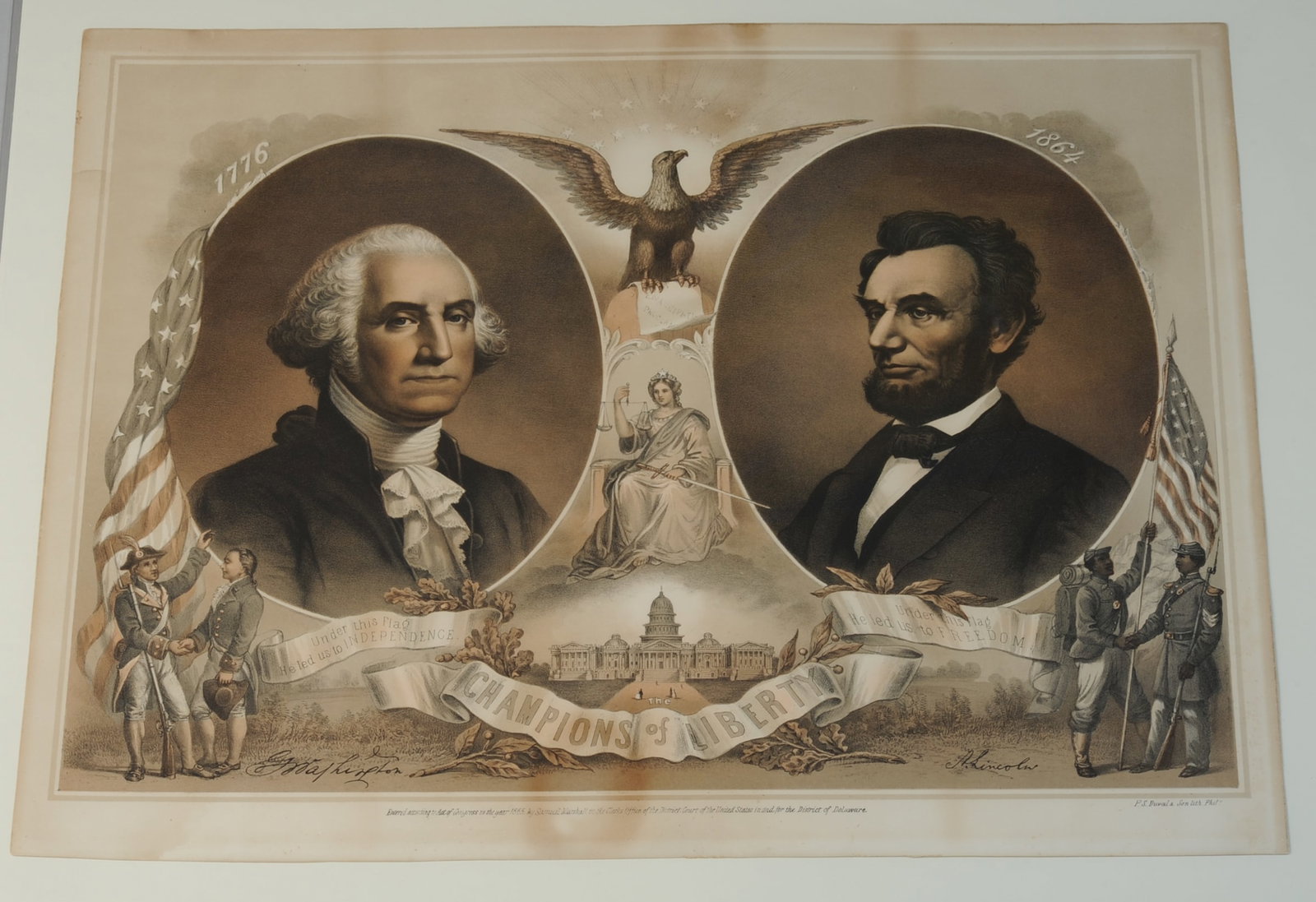 Washington and Lincoln: The Champions of Liberty: Color lithograph published by P. S. Duval & Son of Philadelphia commemorating George Washington and Abraham Lincoln as twin defenders of liberty. Some toning, scattered foxing, and staining. Unframed.