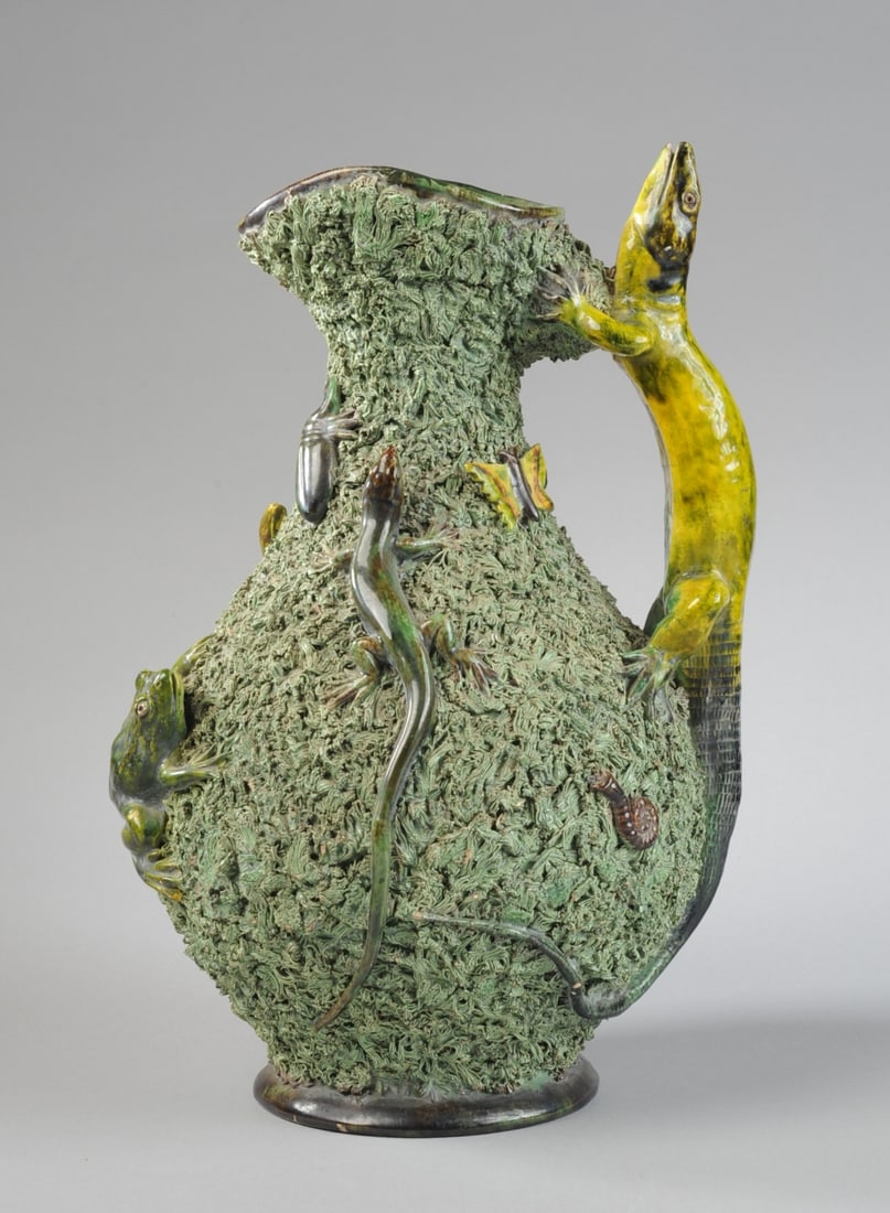 Palissy Ware Ewer, Naill Smith Provenance: With green, mossy ground, the handle a lizard, with salamanders, beetle, frog, centipede, and moths. Unmarked. Base had English shipper's label E. R. Fenton & Co., directed to important New York antiq