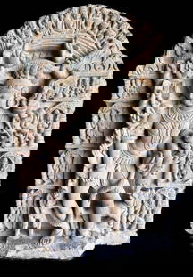 Large 37" Sandstone Stele of Shiva as Bhairava: Carved sandstone stele showing Bhairava, the terrifying form of Shiva, standing in a graceful pose, surrounded by eighteen disembodied hands grasping weapons and symbolic objects. One hand holds a