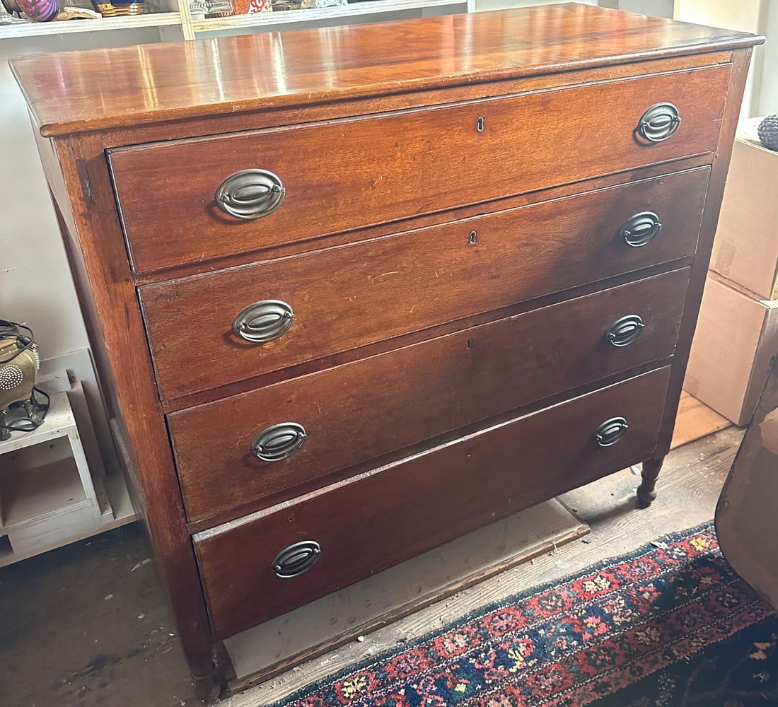 Richmond, Virginia Federal Chest of Drawers: Walnut, probably from the shop of George Hendree (1792 - 1834), four graduated dovetailed drawers with brass pulls, turned feet. H: approx. 38 3/4". W: approx. 41 1/2". D: approx. 18 1/4". Our primary