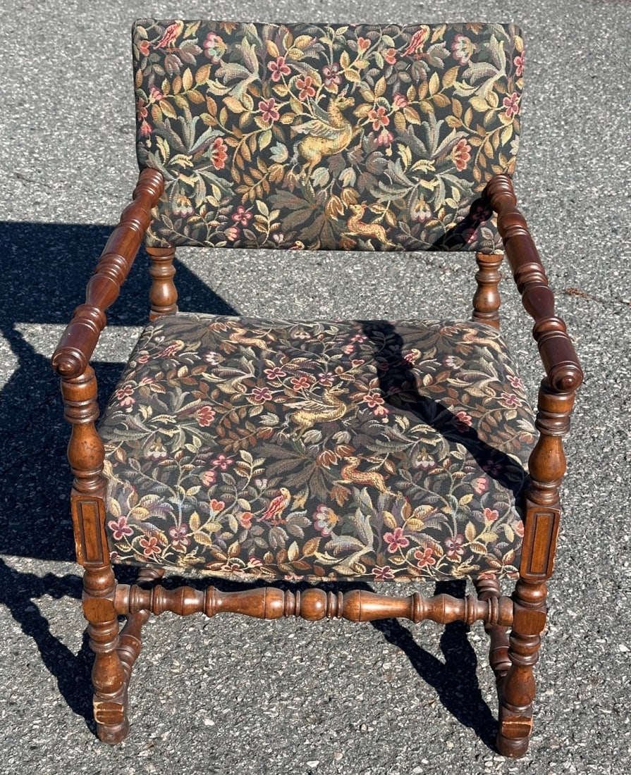 20th C. Baroque Style Upholstered Armchair: Turned arms and legs, upholstery with wildlife and mythical creature motifs. H: approx. 33". Our primary recommendation is to arrange shipping yourself using Blue Ridge Pack & Ship. Most bidders find