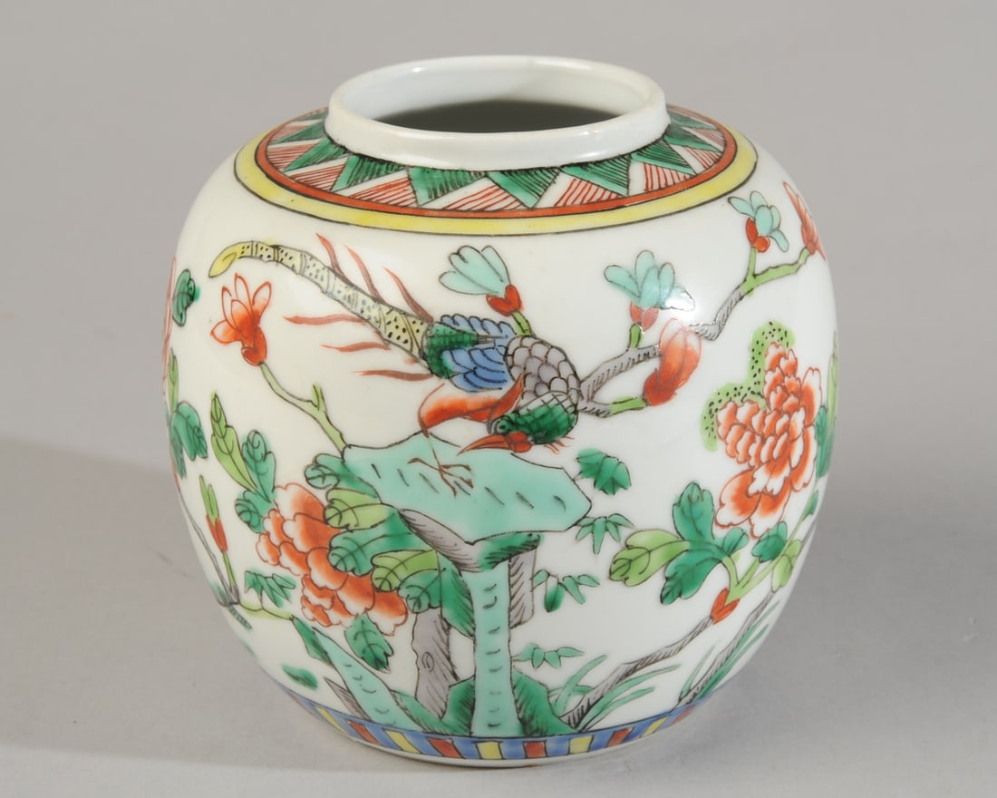 Chinese Republic Famille Verte Porcelain Jar: Round jar decorated with a mythical bird among tree peony in famille verte enamels. Red 'CHINA' to base. Early 20th C. No chips, cracks, hairlines or repairs. Approx. 5" D x 5" H. Our primary recommen