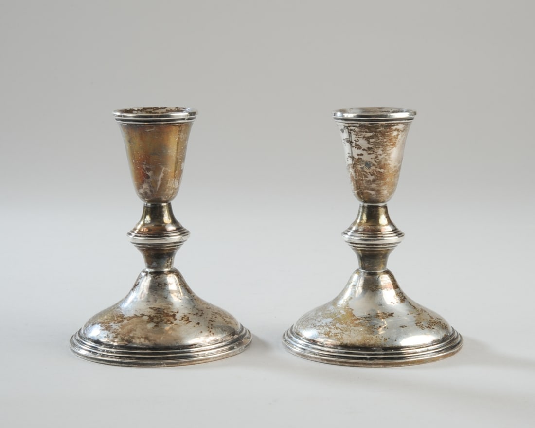Pair of Weighted Sterling Silver Candlesticks: Minor dings / dents. H: approx. 4 1/4", base Dia: approx. 3 1/4". Our primary recommendation is to arrange shipping yourself using Blue Ridge Pack & Ship. Most bidders find this is the most economical