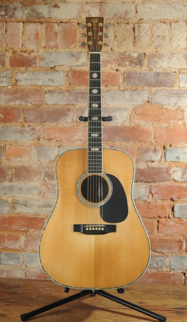 1972 Martin D-41 Acoustic Guitar: Serial number 330865, spruce top with abalone purfling, East Indian rosewood back and sides, ebony fingerboard, Grover tuners. Shows evidence of a prior neck reset, fingerboard binding shows several s