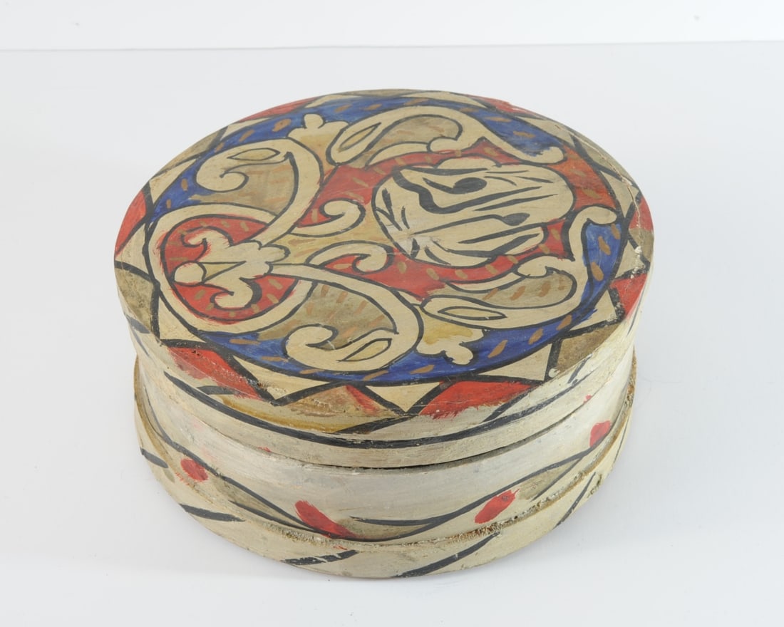Levantine Painted Wooden Devotional Box: Jerusalem or Eastern Mediterranean round bentwood box, the top and sides decoratively painted with arabesques surrounding the name of God in calligraphy. A folk object, likely made for local use, the