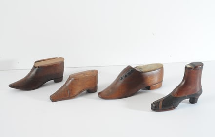 A Group of Four Shoe Form Snuff Boxes