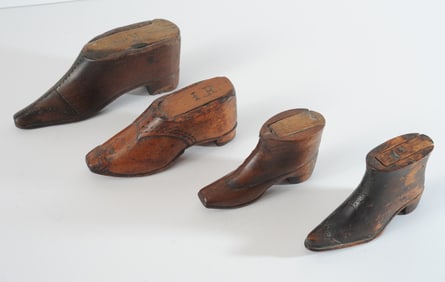 A Group of Four Shoe Form Snuff Boxes