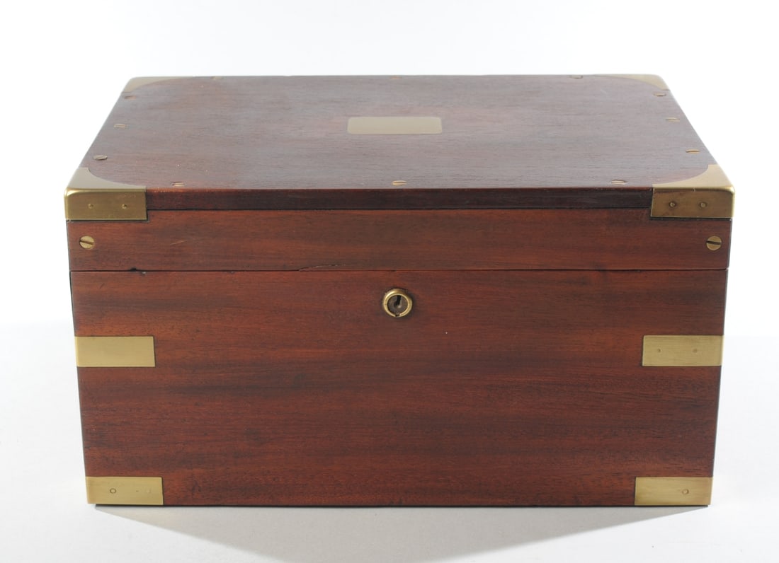 Mahogany & Brass Bound Humidor: With zinc lining, no visible maker's marks, all but one brass feet missing, no key, circa early 20th century. H: approx. 6 1/2". W: approx. 12 1/2". D: approx. 9". Our primary recommendation is to arr