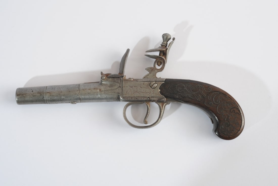 Georgian Flintlock Pocket Pistol, London: A fine English flintlock pocket pistol, signed “KING” and proved in London, dating to the mid–late 18th century, almost certainly the work of Richard King, a documented London gunmaker activ
