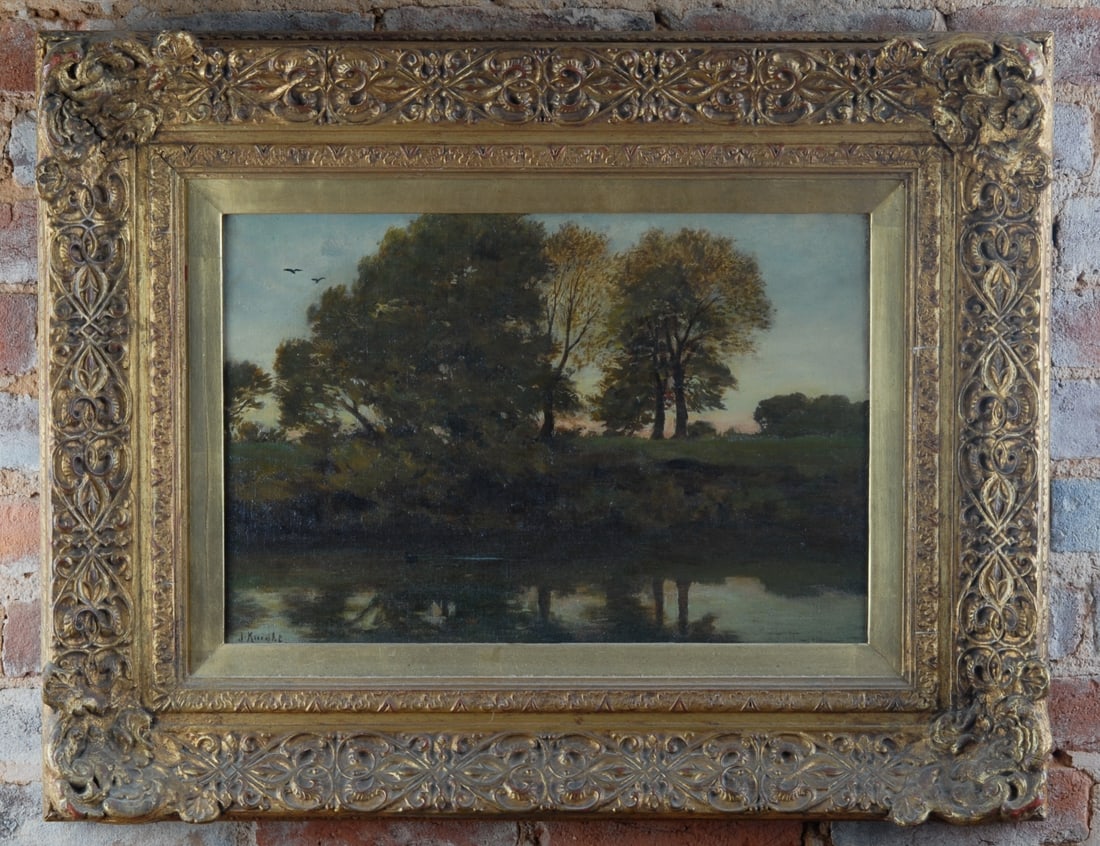 Joseph Knight (British, 1837–1909): "A Summer’s Eve", Oil on canvas, signed lower left. A tranquil twilight landscape depicting a wooded bank beside still water, the trees reflected in the surface beneath a fading evening sky with
