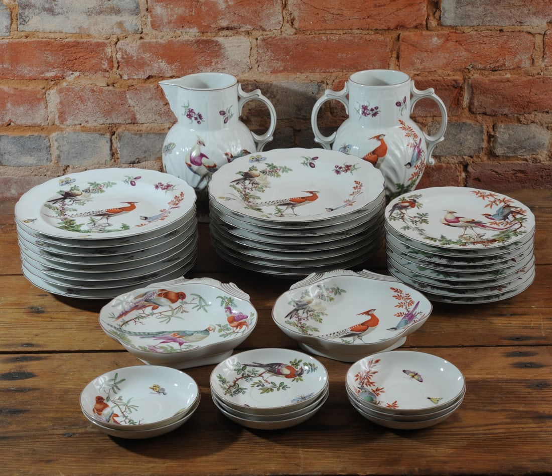 36 pcs. Mottahedeh for Colonial Williamsburg: From the Williamsburg Reserve Collection, group of fine porcelain tableware produced by Mottahedeh for the Colonial Williamsburg Foundation. Decorated in polychrome with exotic birds, butterflies, and