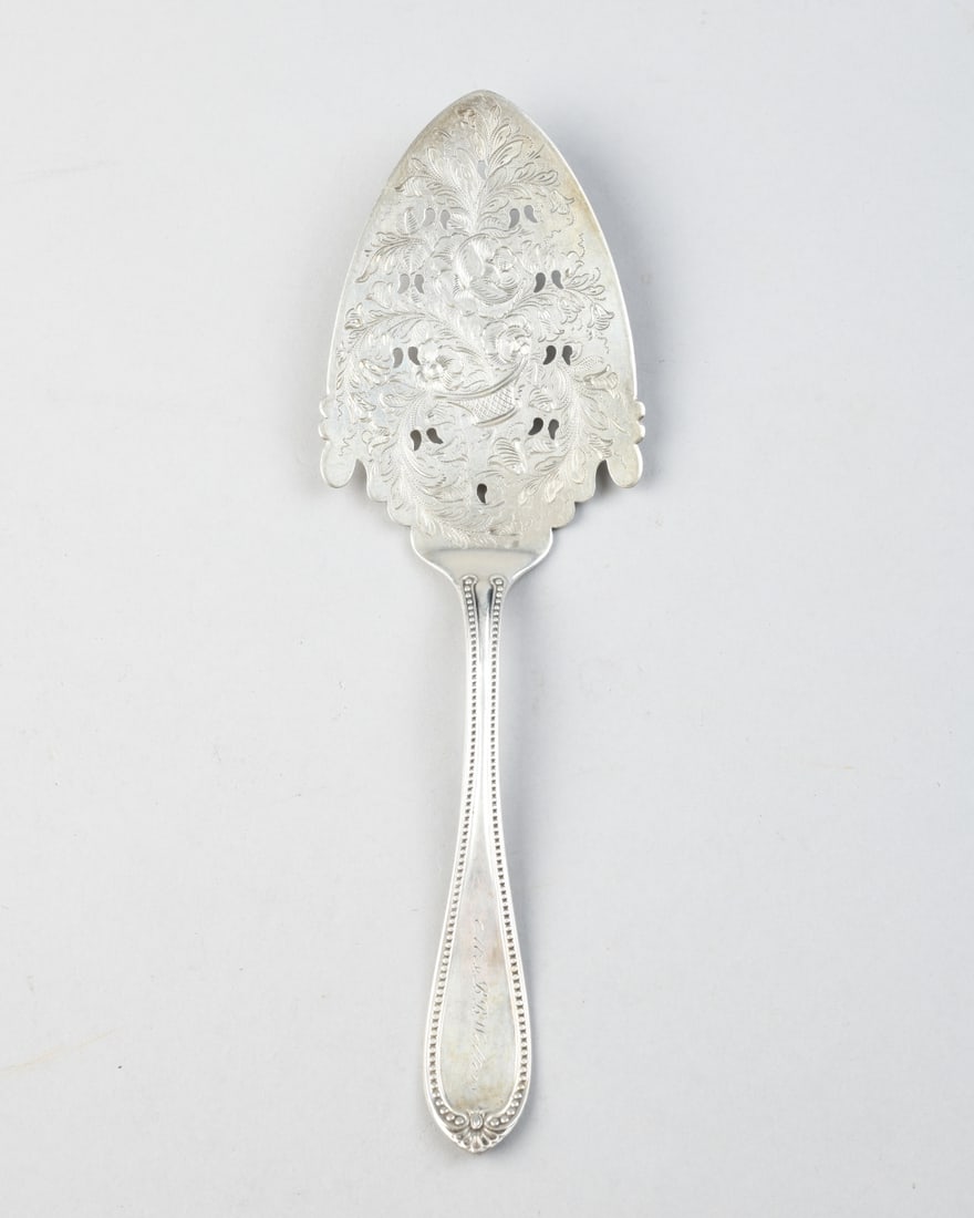 19th C. Norfolk VA Coin Silver Pie Server: Marked for J.M. Freeman (Joseph Mosley Freeman, 1806 - 1882), front of handle inscribed "Mrs. B.B. Walters", back inscribed "Remember Mary". L: approx. 10". Weight: approx. 2.82 ozt.Our primary