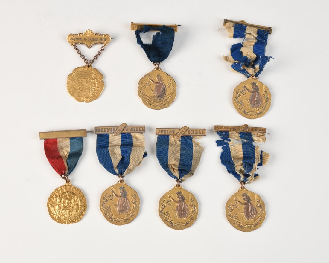Seven Late 19th C. Gold-Plated Rowing Medals: Group of seven American rowing regatta medals. Each with suspension bars engraved for events including “Junior Eight Shell,” “Intermediate Eight Shell,” “Senior Eight Shell,” a