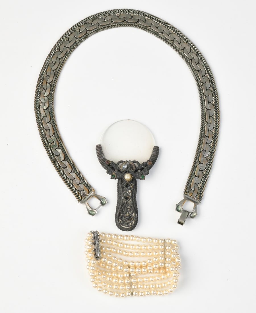 Costume Necklace, Bracelet and Magnifying Glass: Some damage / losses to Magnifying glass.Our primary recommendation is to arrange shipping yourself using Blue Ridge Pack & Ship. Most bidders find this is the most economical route. Simply reach out