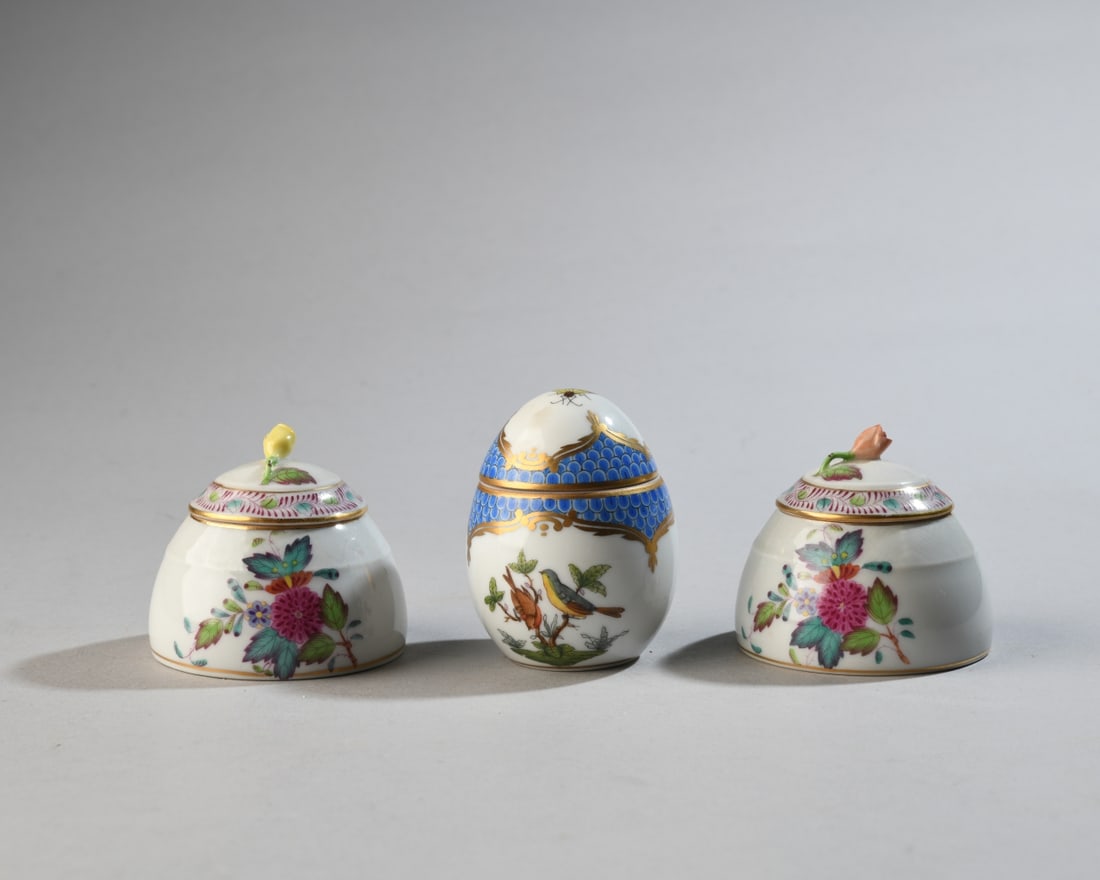 3 Herend Porcelain Trinket Boxes / Mustard Pots: One egg-form covered piece with bird and insect decoration and two covered bowls with polychrome floral decoration and applied flower finials, all marked to undersides, no visible chips, cracks or