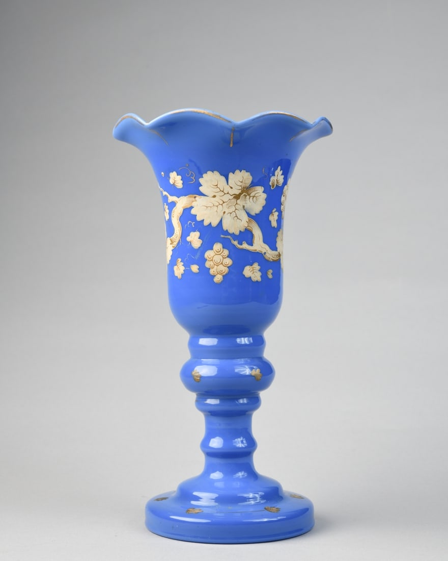 Blue Opaline Glass Vase: With flared scalloped rim, baluster stem and circular foot, decorated in gilt and enamel with flowering branch motifs, likely French, unmarked. Surface wear to gilding and scattered minor losses. H: a