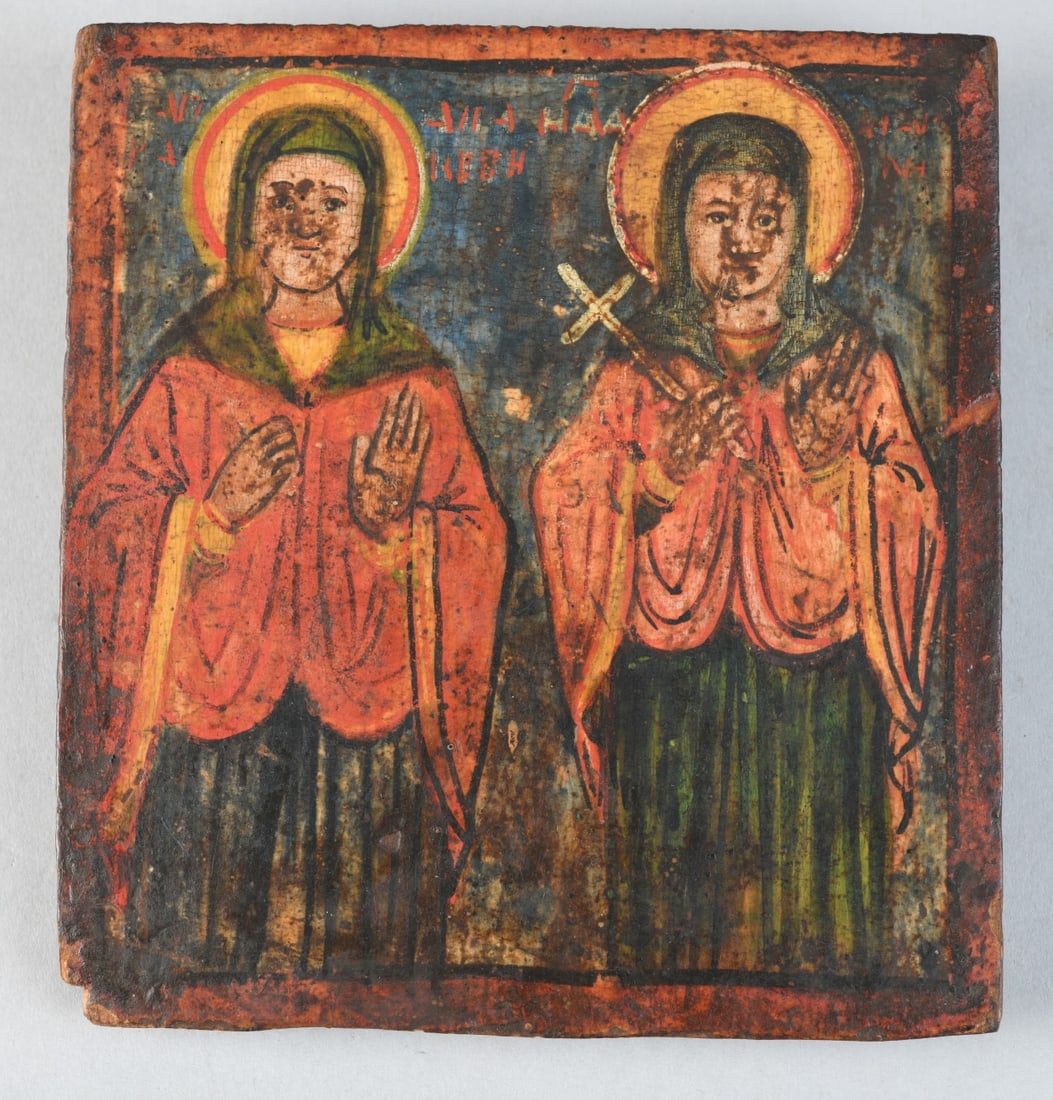 Russian Icon of Two Female Saints: Tempera on wood panel, probably 19th century, depicting two haloed female saints standing frontally against a dark ground, possibly Paraskeva and Barbara or related martyrs, some minor wear. Approx.