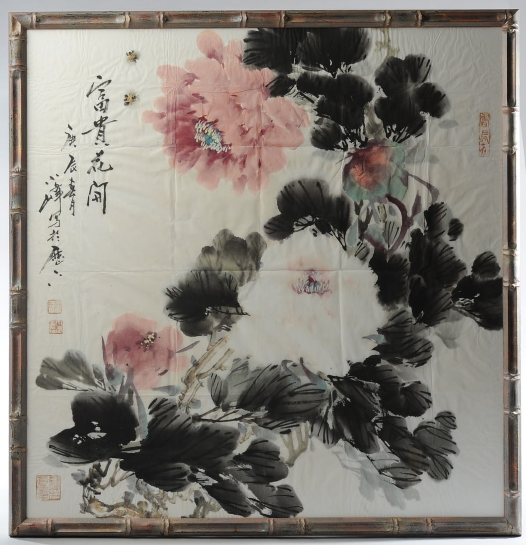 Chinese Ink & Watercolor Painting of Peonies, Bees: Ink and watercolor on paper depicting blooming peonies with two bees in flight, with inscription and multiple red artist seals. Framed in a bamboo-style frame under glass, inscription includes the