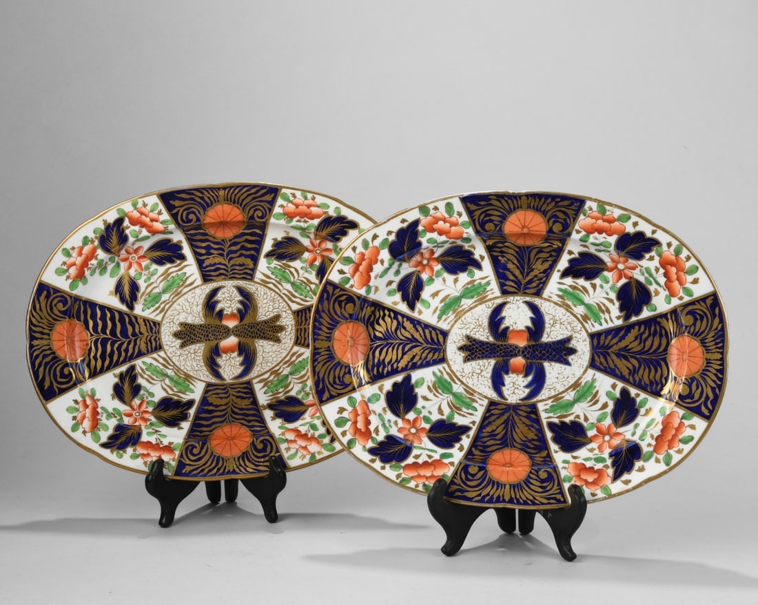 Pair of Imari Style Samson Porcelain Dishes: A matched pair of Samson porcelain dishes, richly decorated in the Japanese Imari palette with cobalt blue, iron-red, and extensive gilding. Dimensions approx. 12 1/8" x 9 1/8". Our primary recommenda