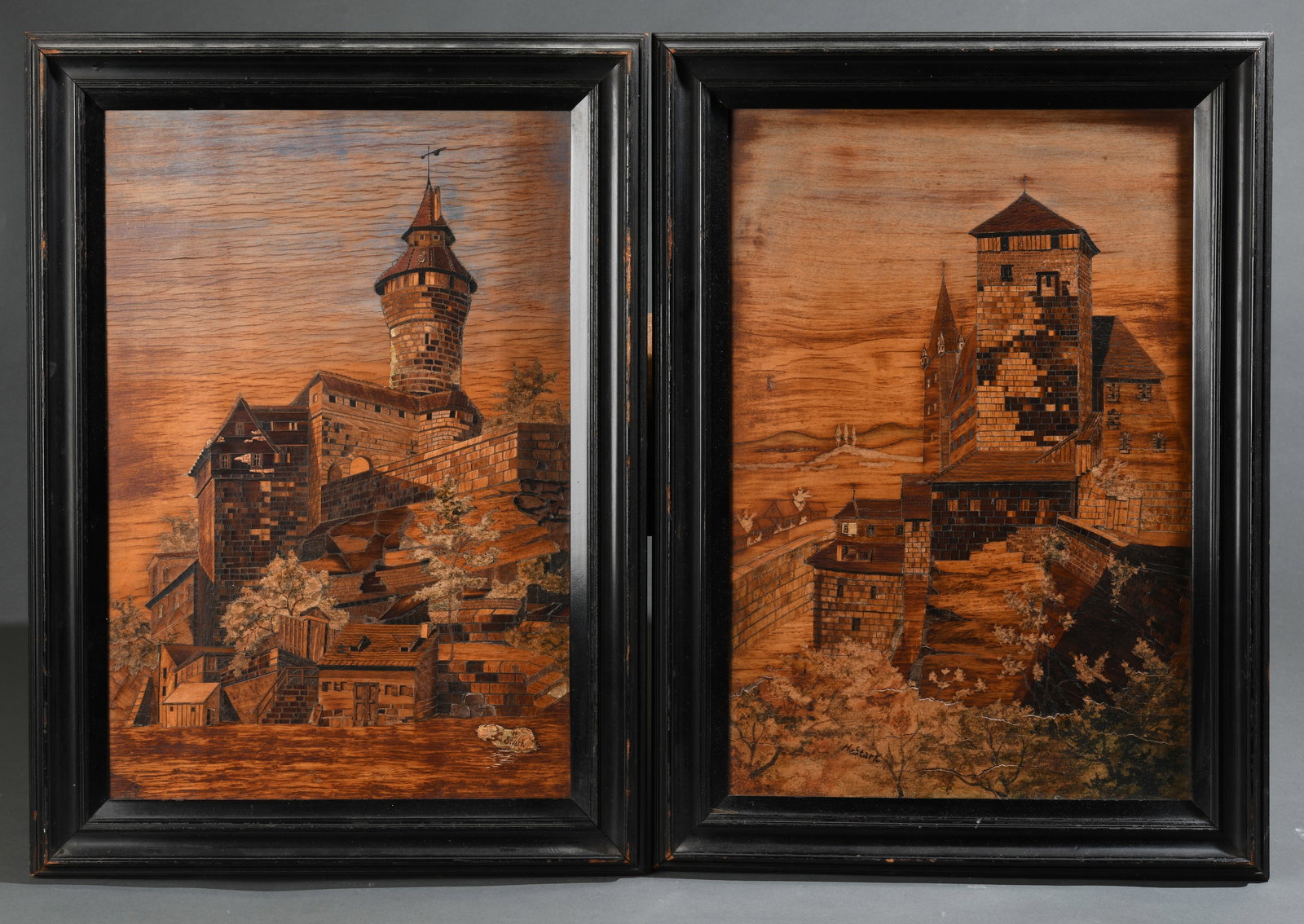Pair of Signed Marquetry Architectural Panels: Late 19th / early 20th century, pair of marquetry and parquetry wood veneer panels depicting medieval European town and castle scenes, composed of contrasting wood veneers with stained and incised det