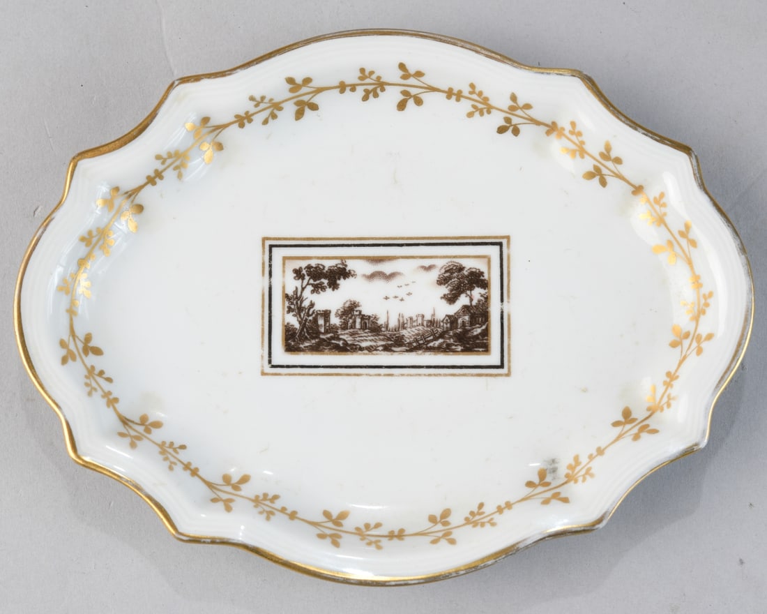 Small Richard Ginori Dish: Of lobed oval form with molded rim, white ground with gilt foliate border and central sepia scenic transfer within rectangular reserves; underside with printed PITTORIA RICHARD GINORI / ITALY mark and