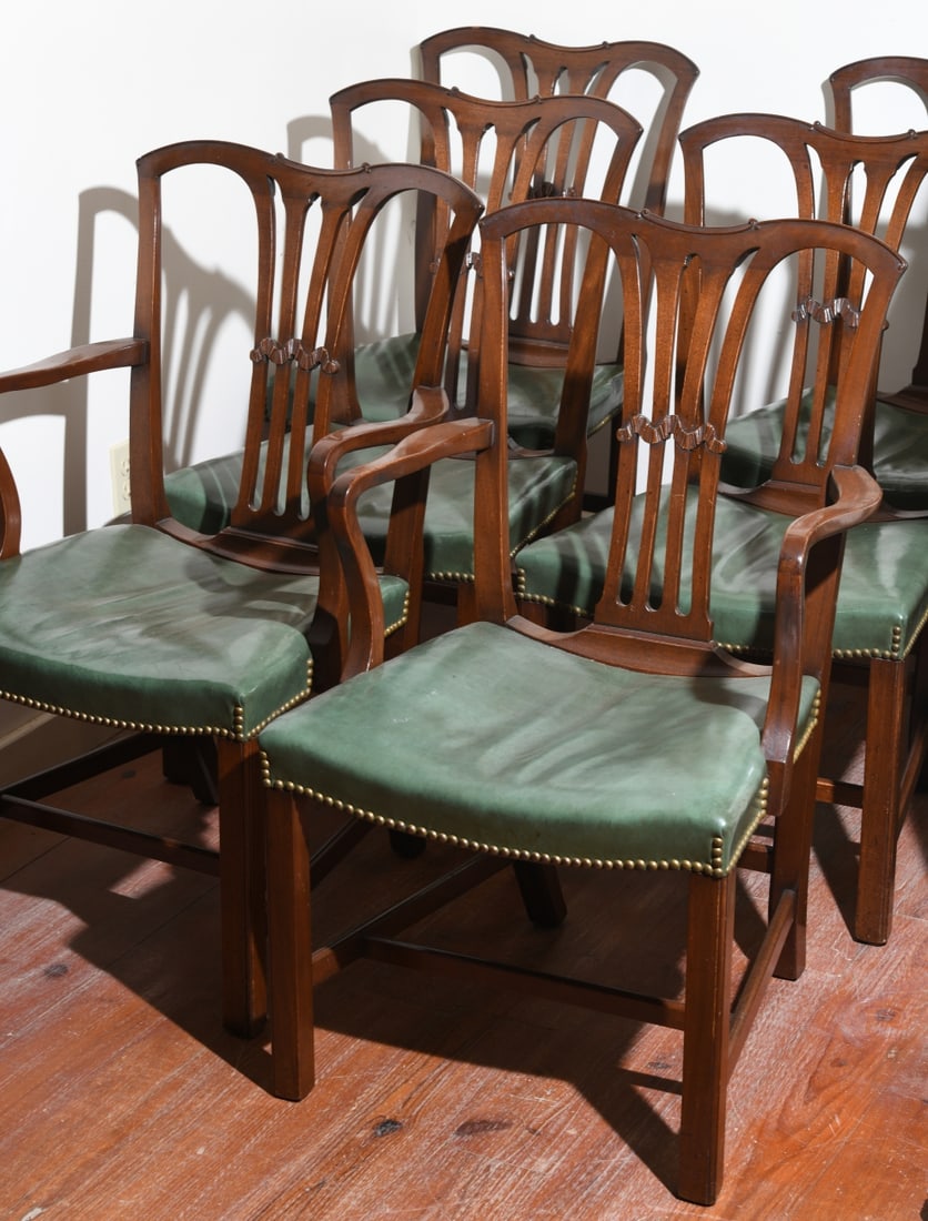 Six Marlboro Manor by Sacks Dining Chairs: 20th century, two armchairs and four side chairs, shaped crest rail with pierced splats, green leather upholstered seats with brass nailhead trim, some minor wear and losses. Armchair dimensions