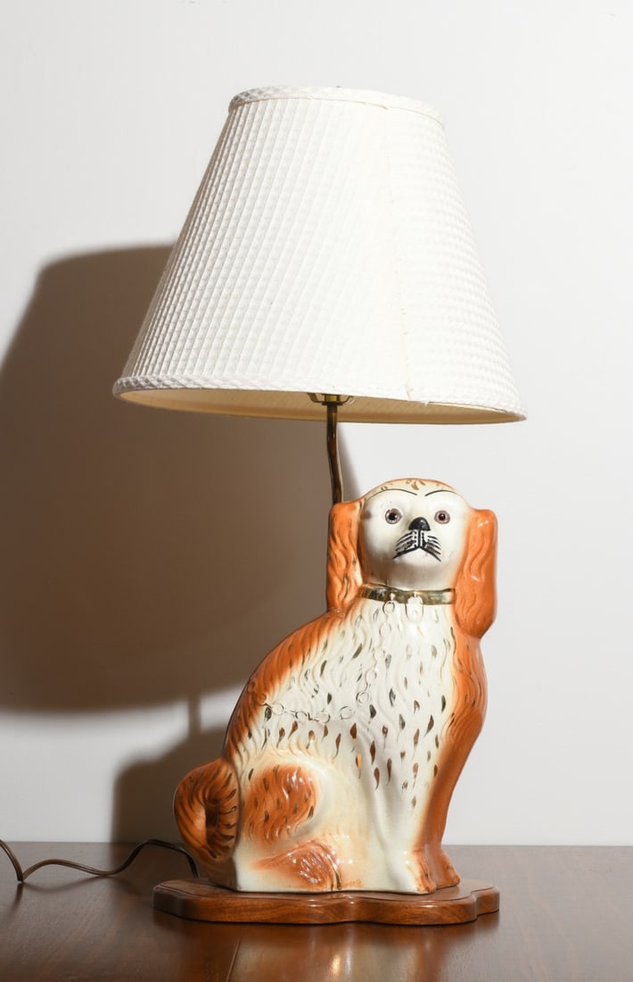 Staffordshire Spaniel + Lamp: Late 19th/early 20th century Staffordshire spaniel together with 20th century lamp, with fitted base for displaying spaniel. Spaniel with all-over crazing, some gilt fading, lamp powers on. Spaniel di