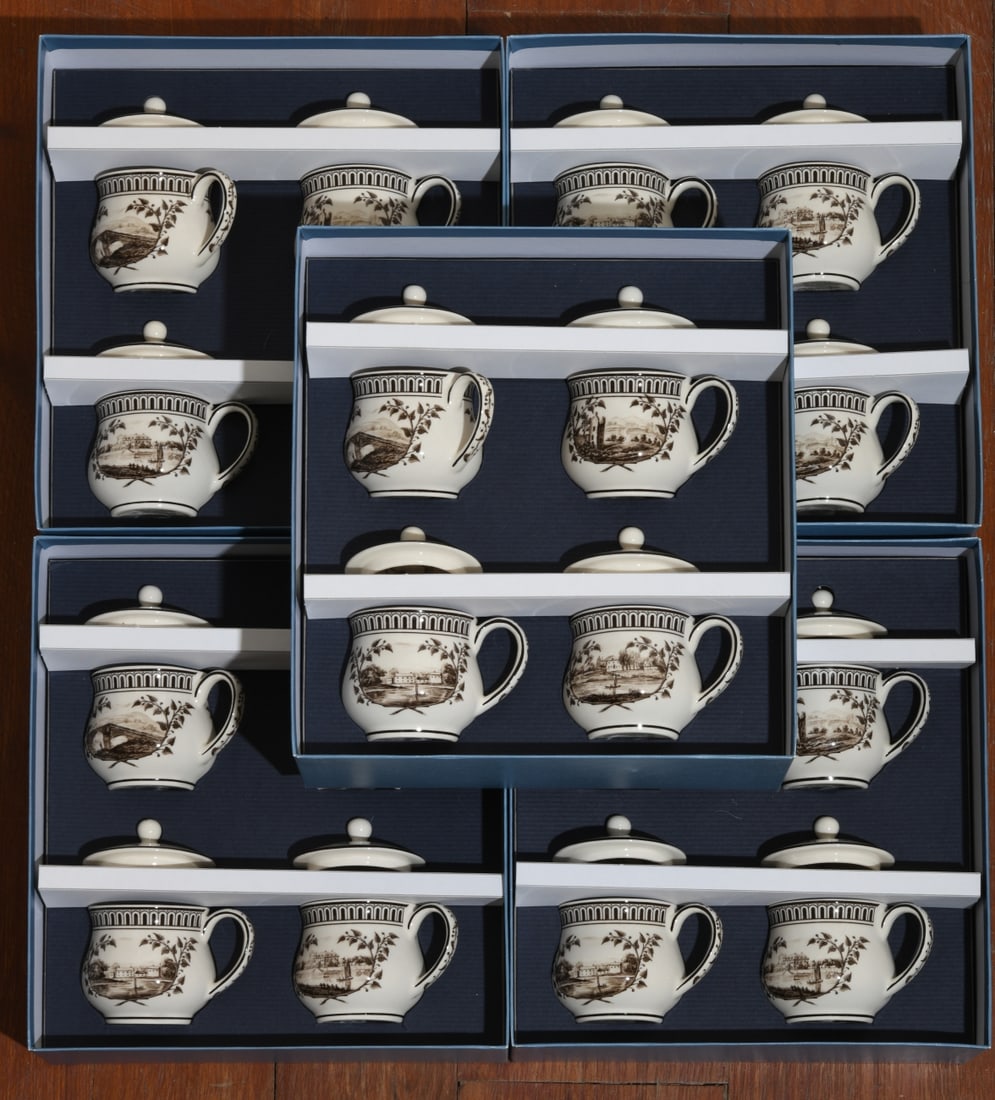 20 pcs. Wedgwood Genius Collection Lidded Cups: Twenty Wedgwood Queen’s Ware “Genius Collection” lidded cups, each transfer-decorated with views after the celebrated “Frog Service” commissioned by Catherine II of Russia in 1773,