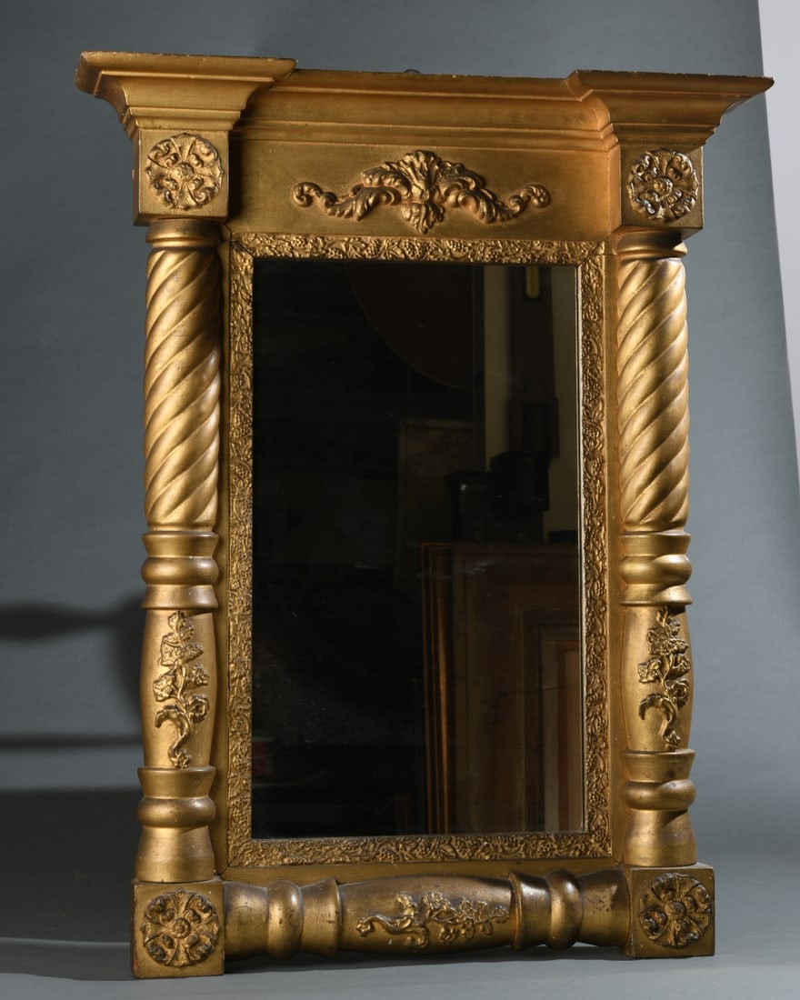 Victorian Gilt Pier Mirror: With molded cornice above spiral twist columns, floral carved ornament, and rectangular mirrored plate (probably later), some wear and age cracking / separation to frame. Approx. 30" x 23 3/4" x 4 1/2