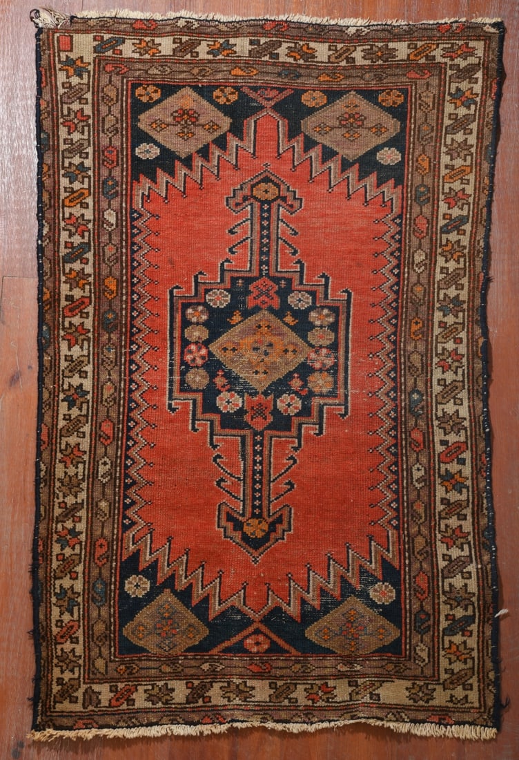 Early 20th C. Hand-knotted Tribal Rug: Dimensions approx. 4'11" x 3'2". Our primary recommendation is to arrange shipping yourself using Blue Ridge Pack & Ship. Most bidders find this is the most economical route. Simply reach out to them