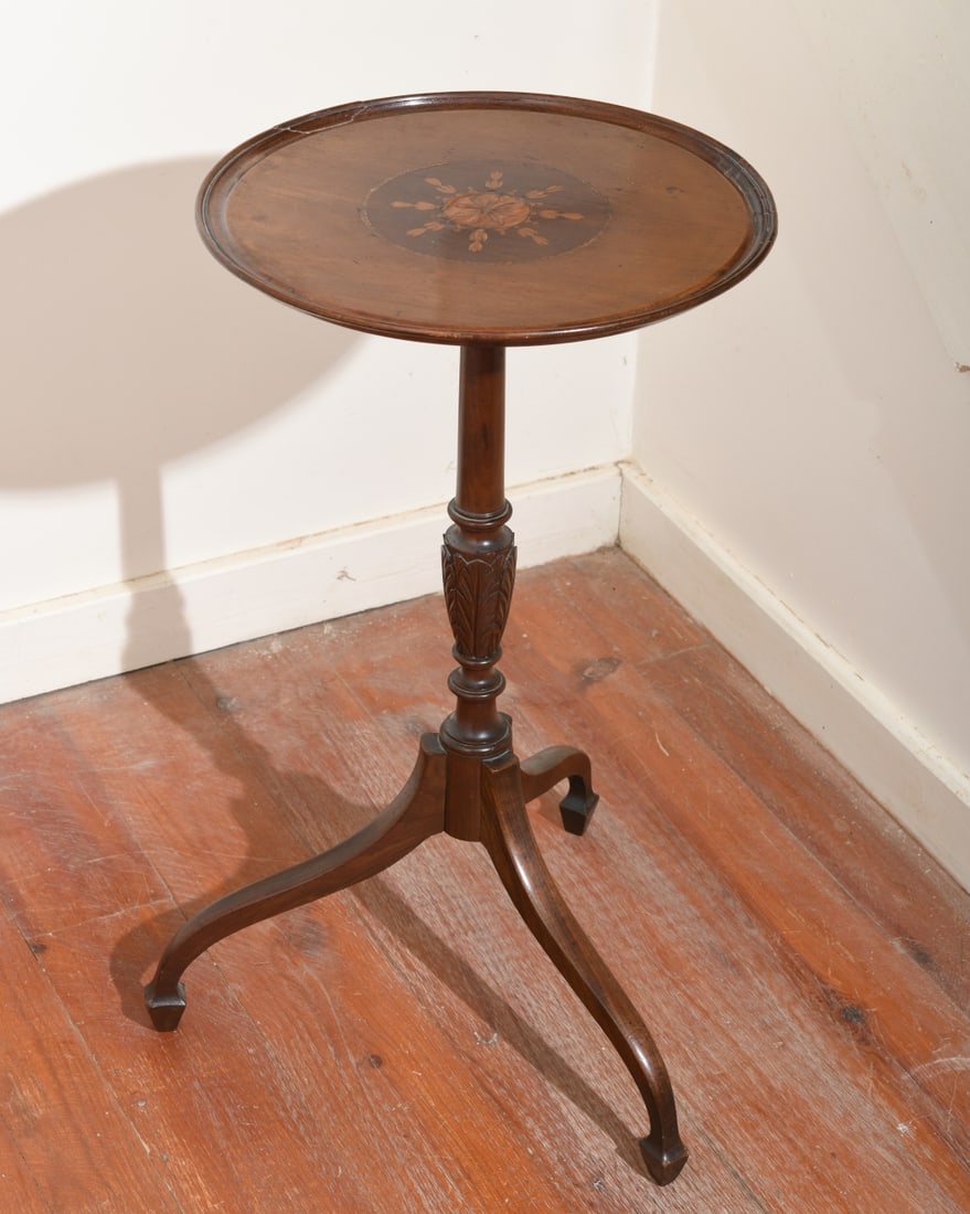 Edwardian Inlaid Mahogany Wine Table: English Edwardian mahogany wine or lamp table, early 20th century, having a circular dished top centered by an oval floral and foliate marquetry inlay medallion, raised on a turned pedestal support wi