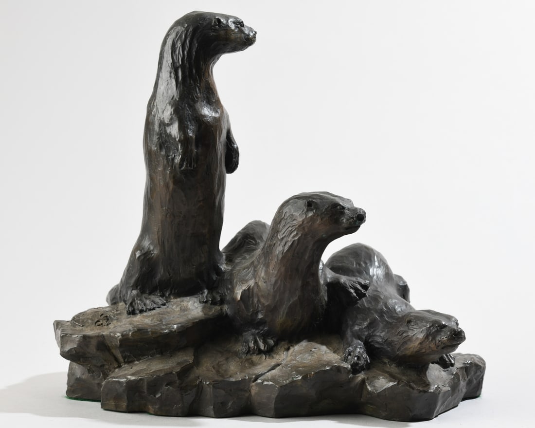 William H. Turner (American, 20th C.) Bronze: Three otters together on a rocky outcrop, bronze by William H. Turner, signed, numbered 41/50 and dated 1989. Approx. 10 1/2" x 12" x 7". Our primary recommendation is to arrange shipping yourself