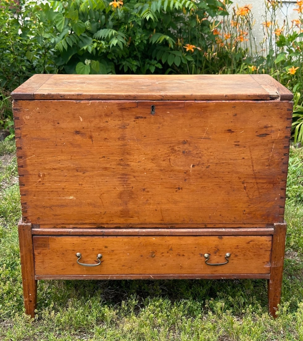 19th C. North Carolina Cherry Sugar Chest: Dovetailed construction with hinged lid opening to interior with divider over single drawer with brass pulls, yellow pine secondary, circa 1820 -1830, some damage and wear. Approx. 32" x 35 3/4" x 18