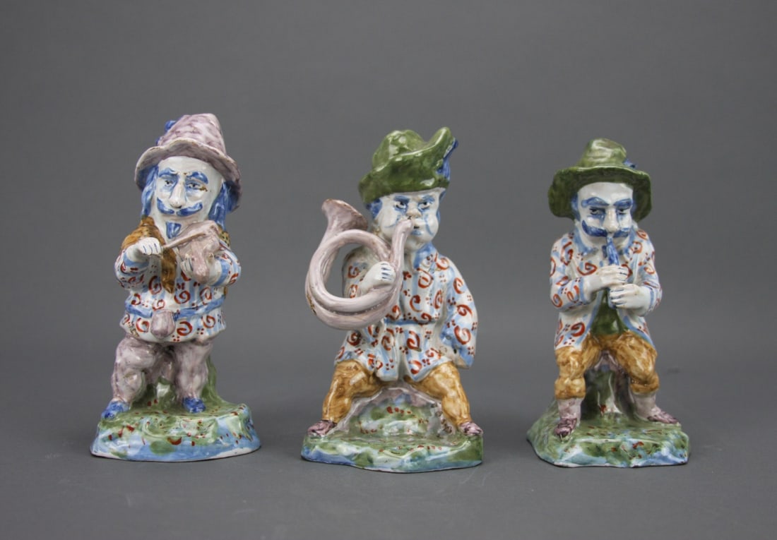 3 Meissen Style Faience Dwarf Band Figures: Three Continental Meissen style Faience dwarf band figures. Marked on base. Tallest 6" high. Our primary recommendation is to arrange shipping yourself using Blue Ridge Pack & Ship. Most bidders find