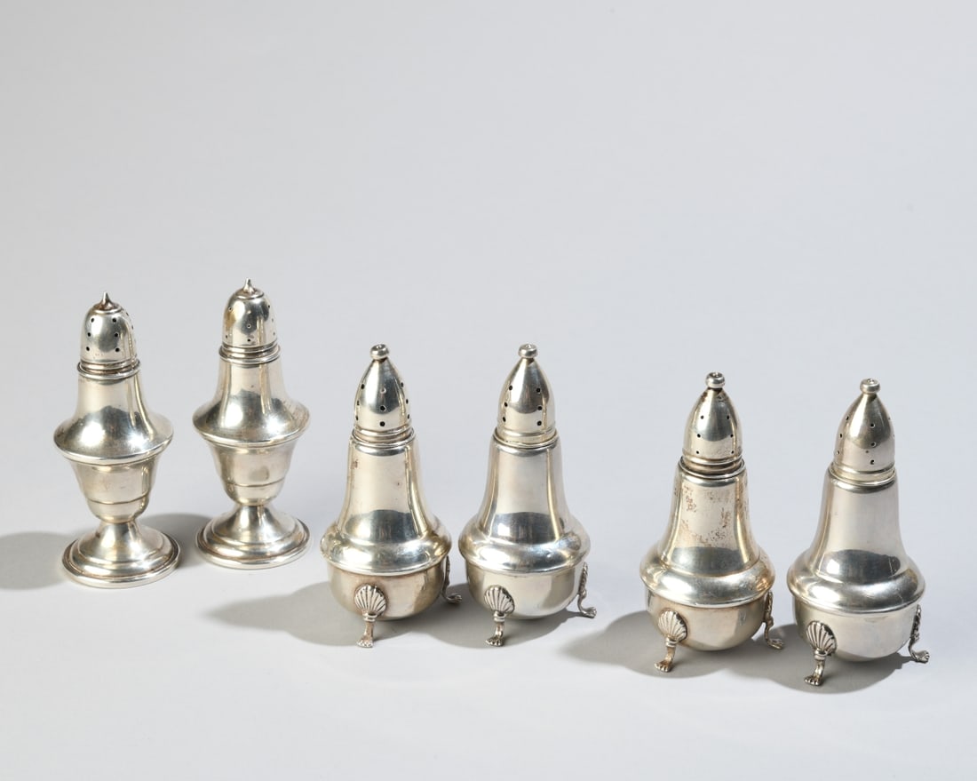 Six Weighted Sterling Silver Shakers: No monograms, marked to underside. H: approx. 4", Dia: approx. 1 3/4". Our primary recommendation is to arrange shipping yourself using Blue Ridge Pack & Ship. Most bidders find this is the most
